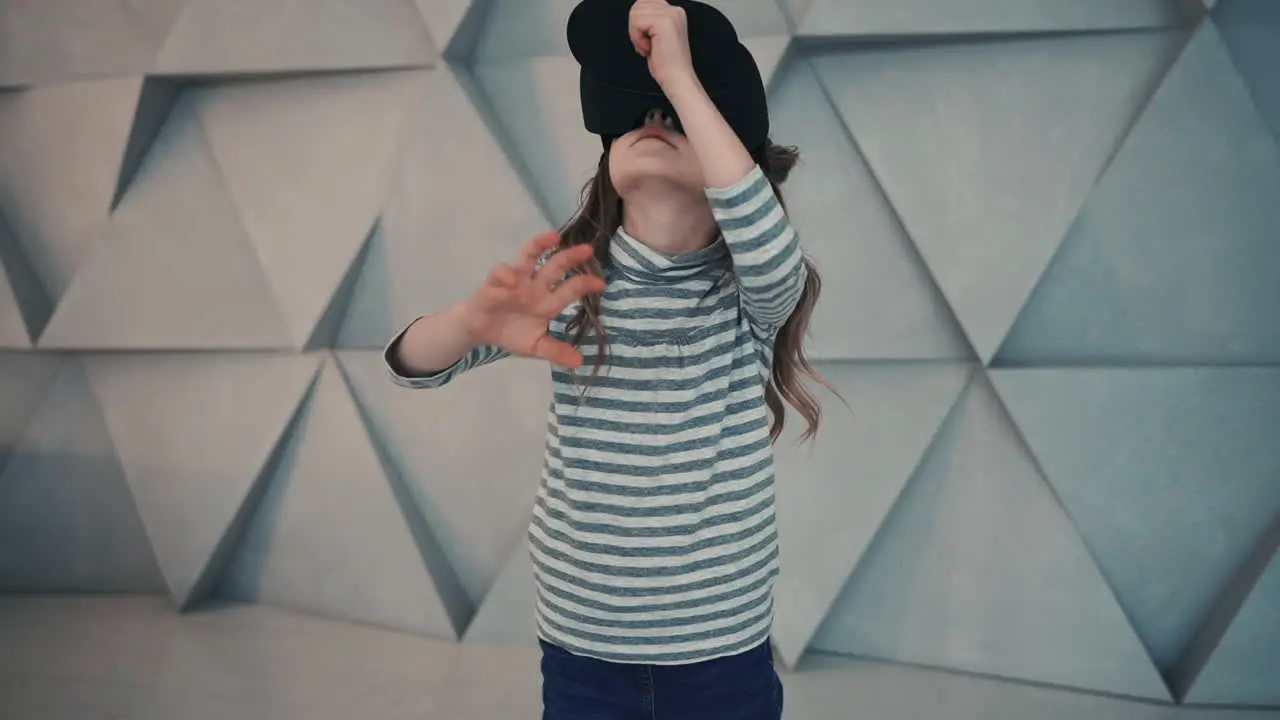 Child Using A Vr Headset Enjoying A Video Or Interactive Game