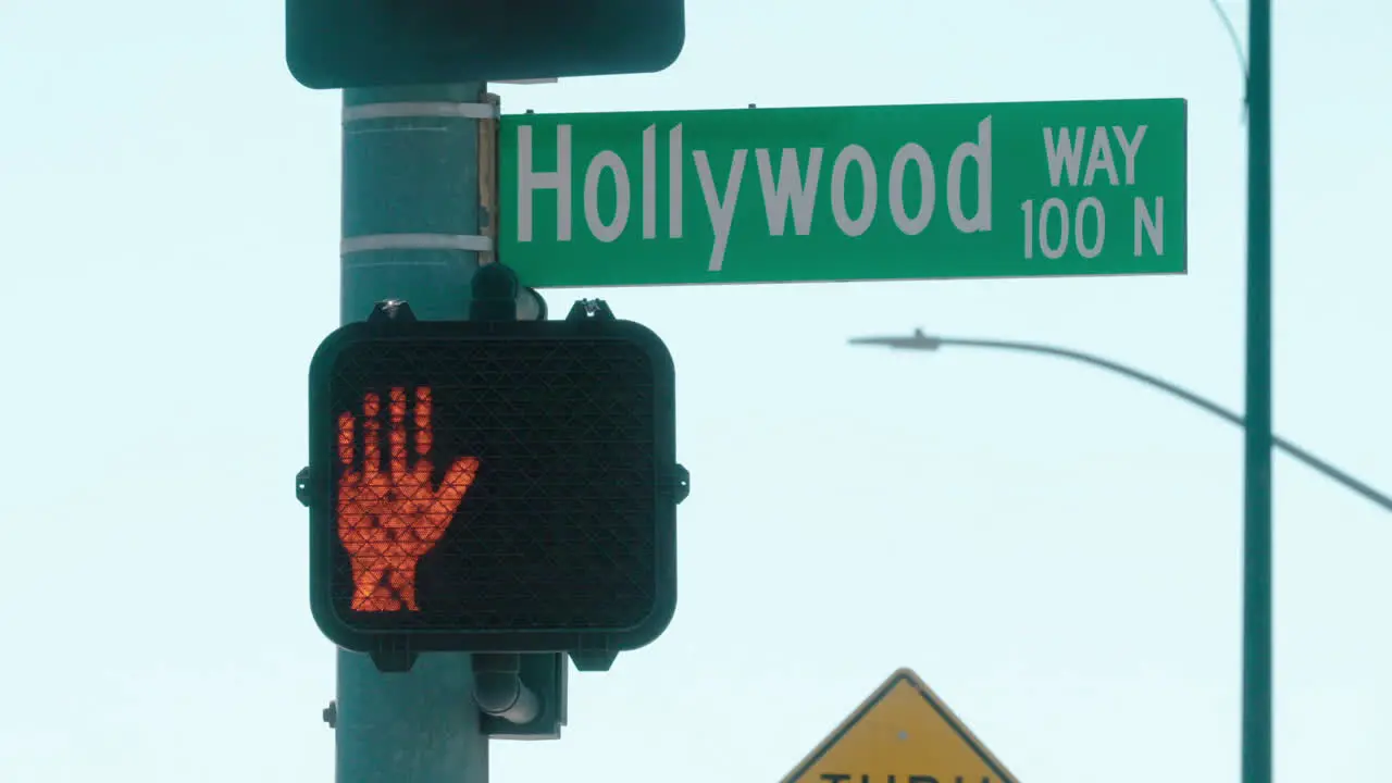 A Timelapse of the Hollywood Way Street Sign with Traffic