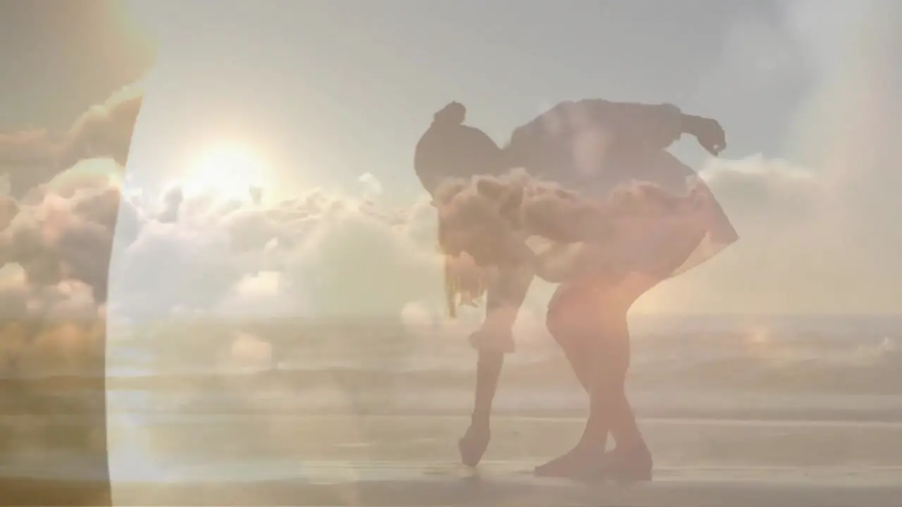 Animation of clouds over caucasian woman walking on beach