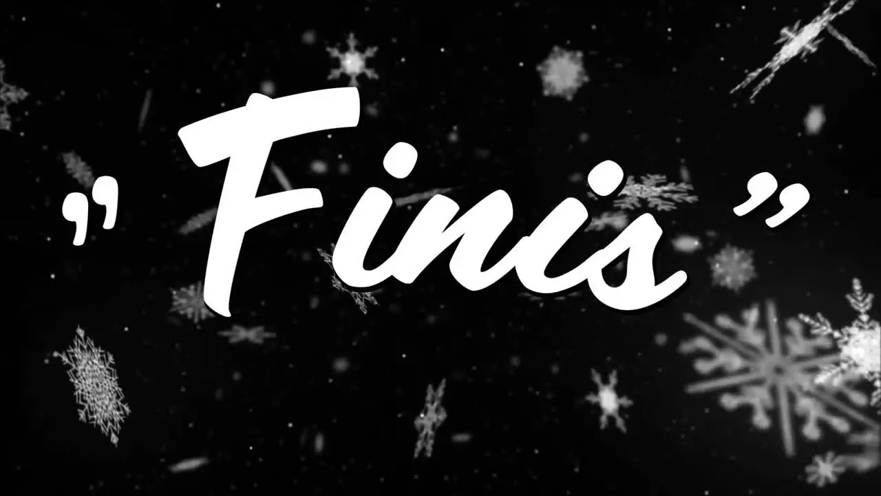 Animation of finis text over falling snow