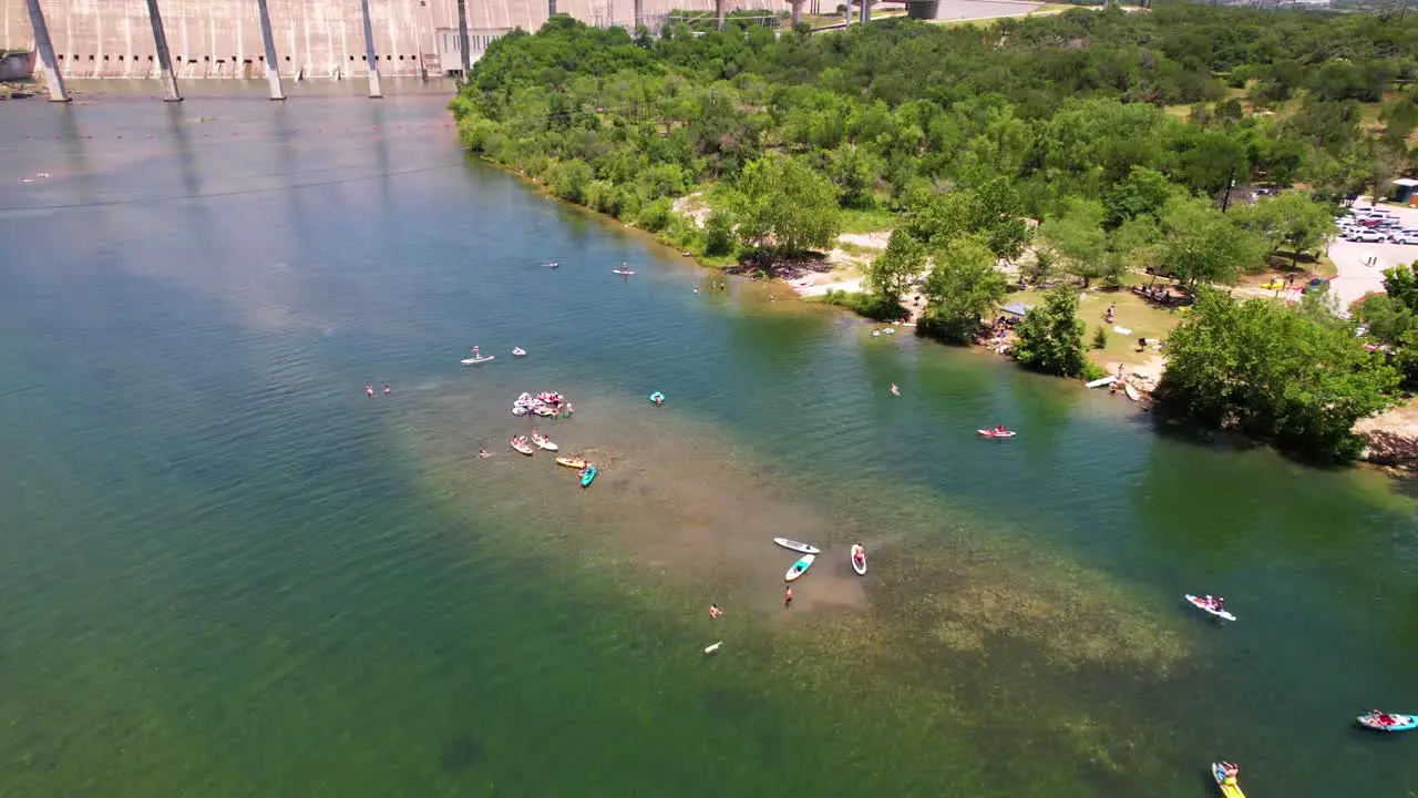 Aerial footage of people swimming at Jessica Hollis Park in Austin Texas