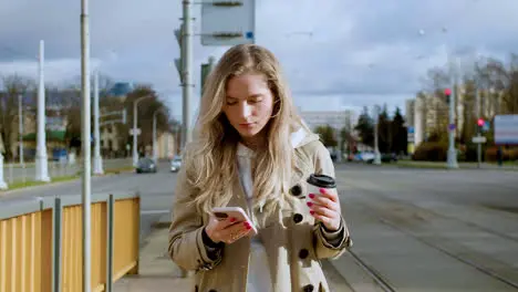 Young woman at bus stop