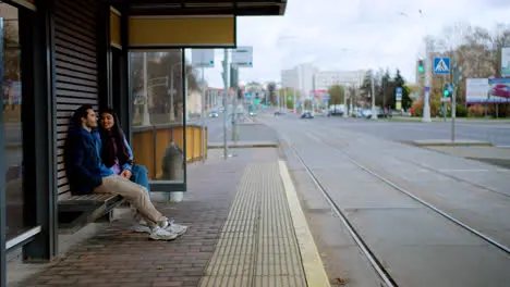 Couple at tram stop