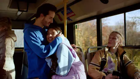 Couple talking in a bus