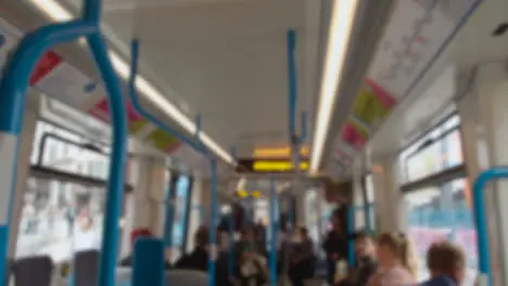 Defocused Interior View Of Tram With Passengers In Birmingham UK