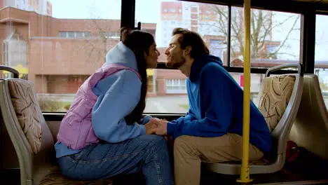 Couple sitting in the bus