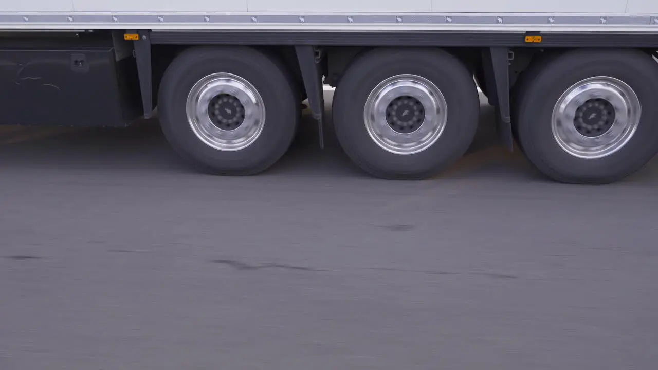 Wheels of truck moving on highway