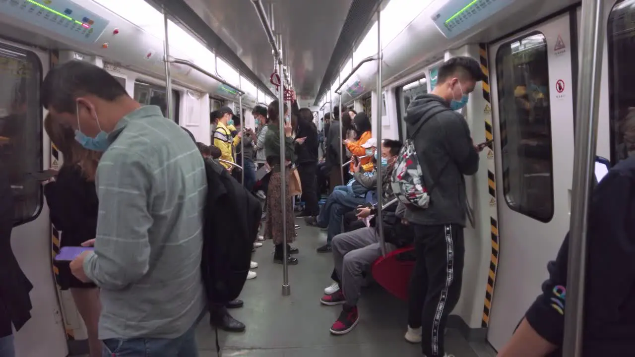 People traveling in metro carriage during COVID-19 Pandemic time