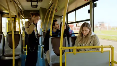 Young woman sitting in the bus