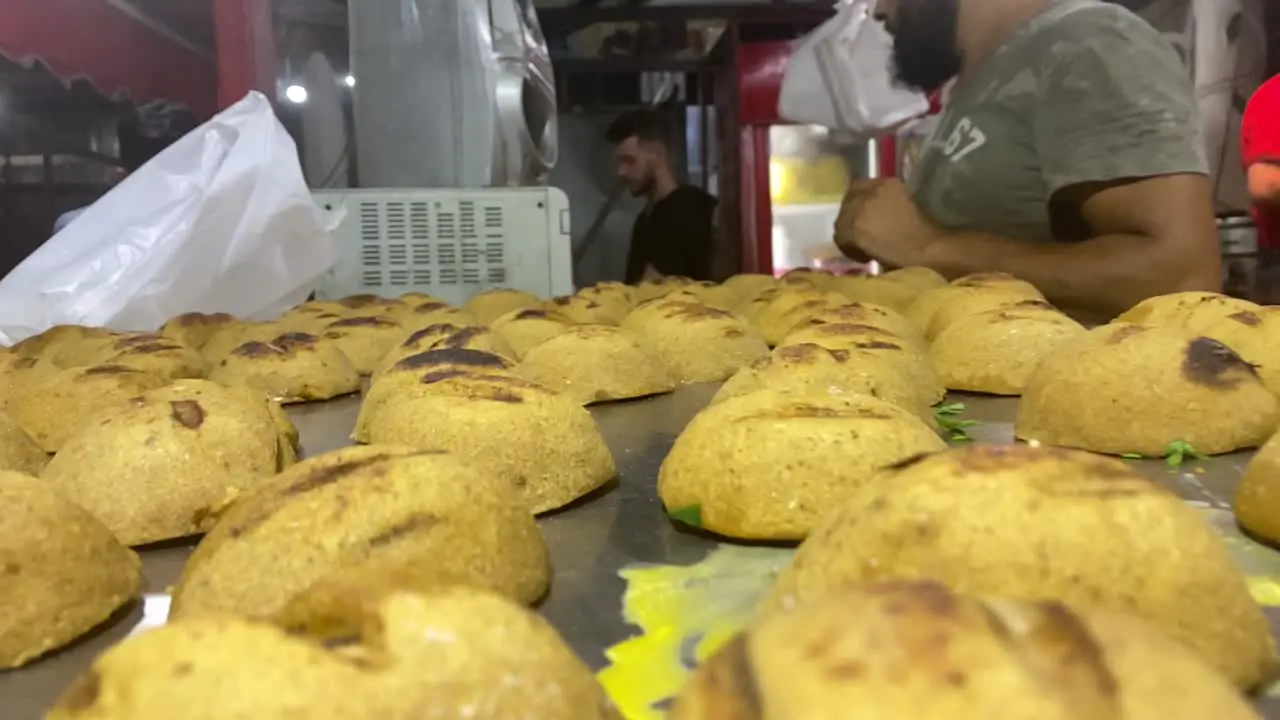 Freshly Baked Bread In A Bakery In Lebanon With Lebanese Bakers In Background