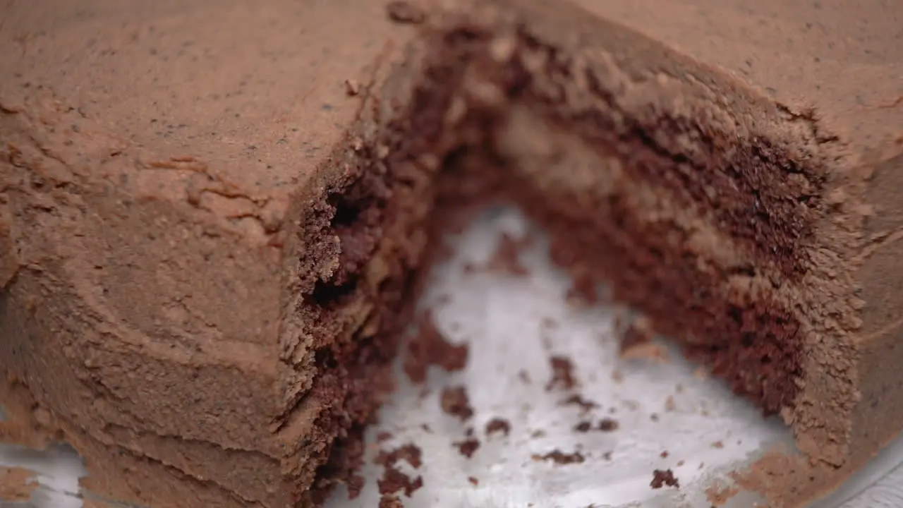 Closeup of a delicious chocolate layer cake that was cut