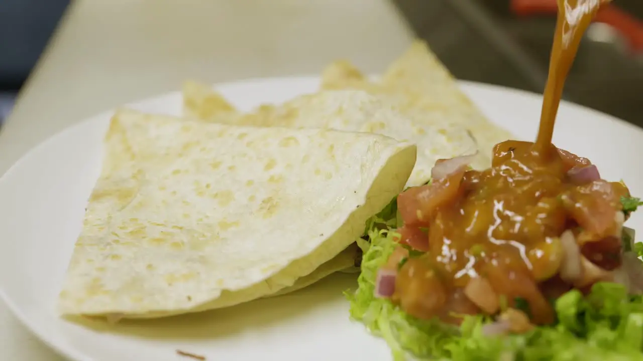 Quesadillas with hot sauce Mexican food