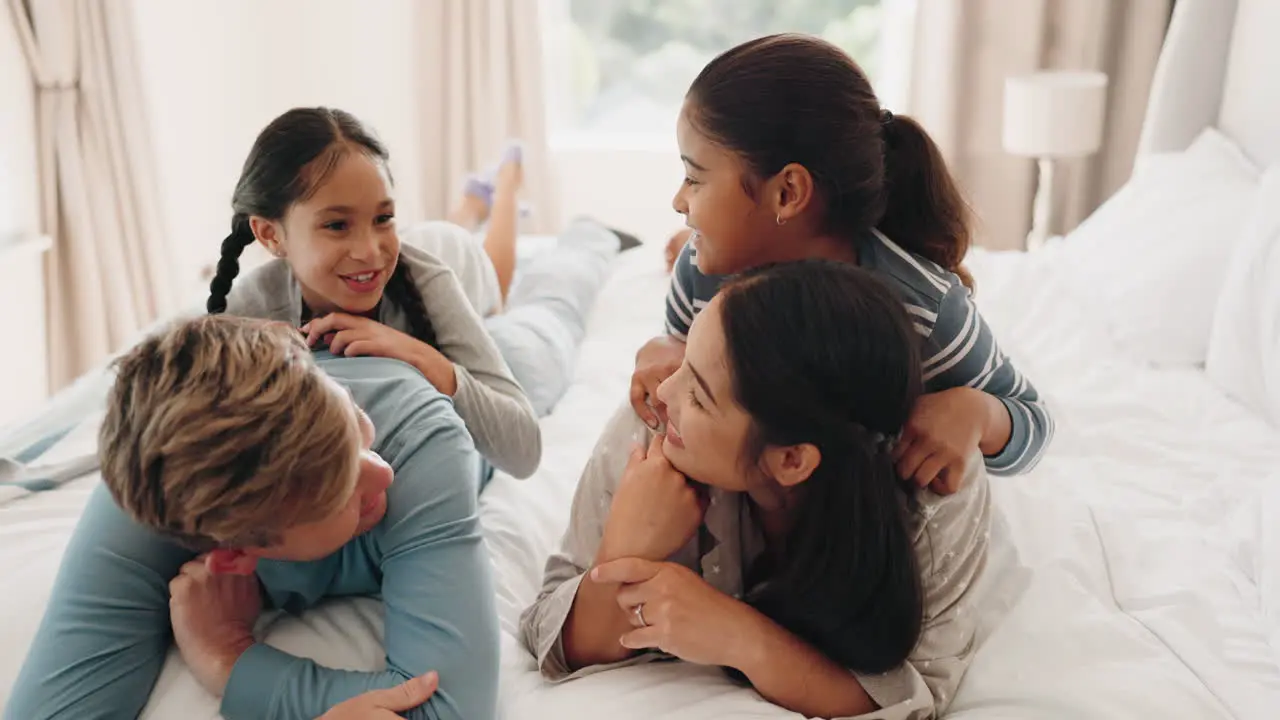 Happy family bed and children conversation