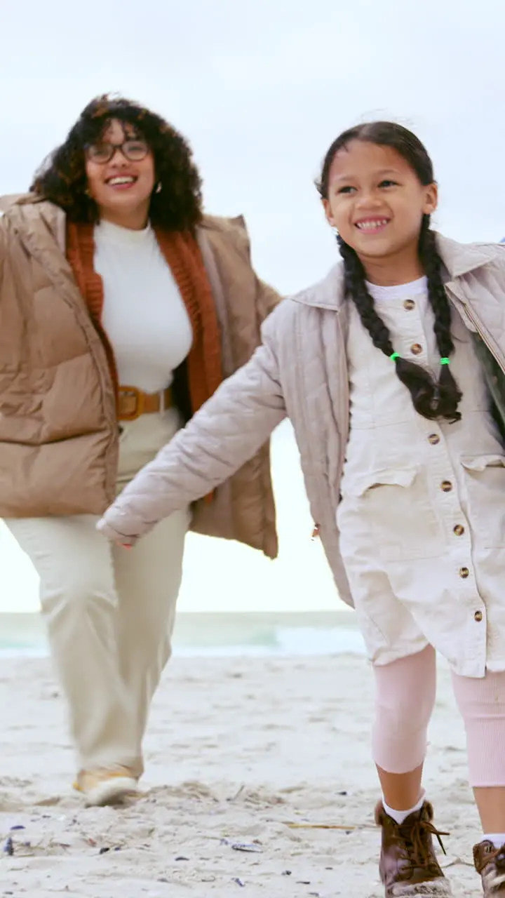 Happy family on beach playing with parents