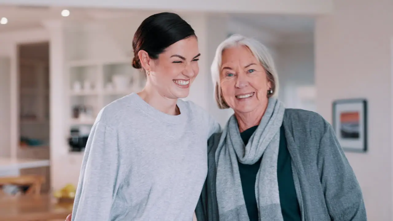 Senior woman daughter and hug in living room