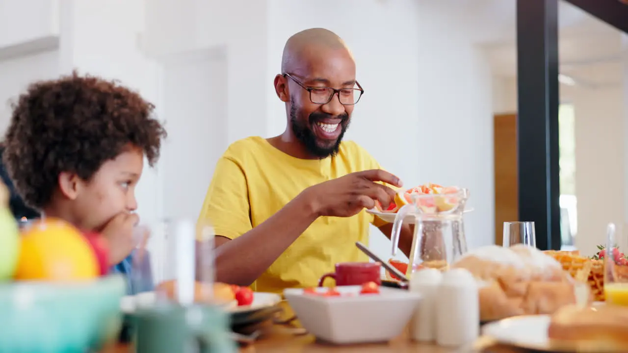 Father child or lunch with fruit at table