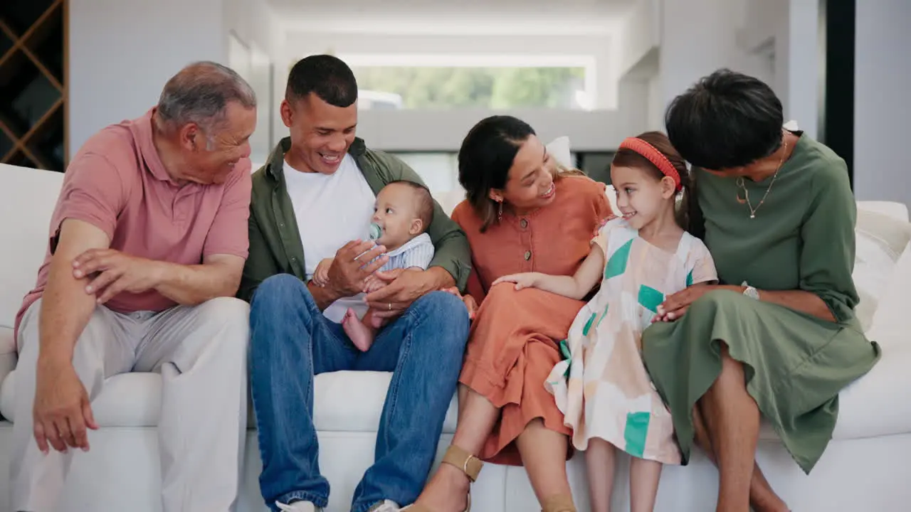 Smile big family and baby children on sofa