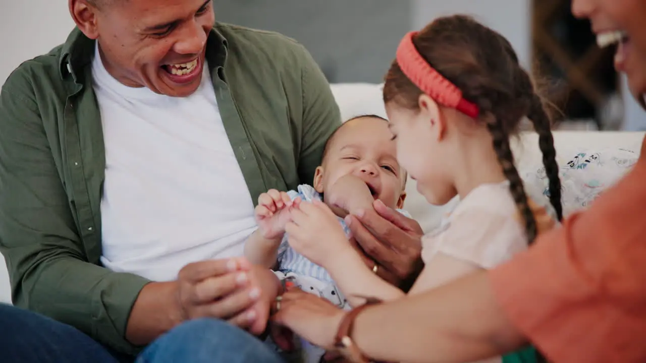 Happy family baby and parents play in living room