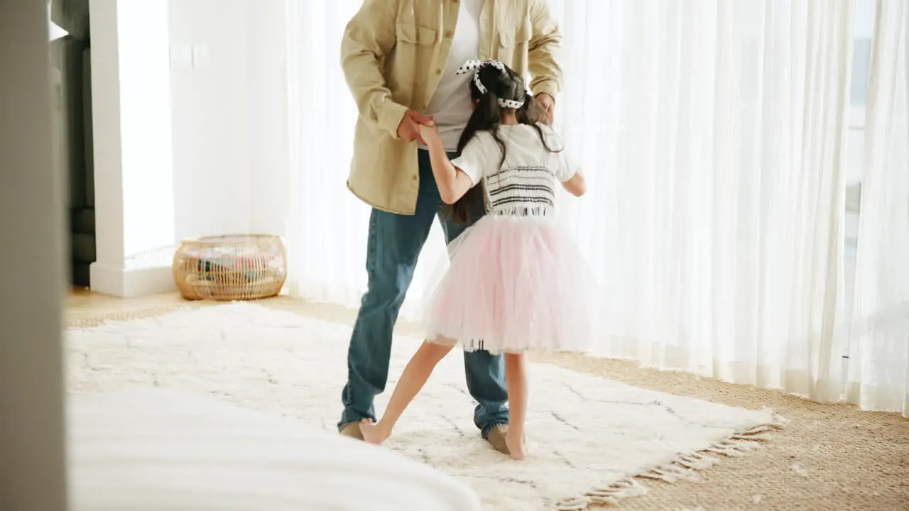 Father and daughter dancing and love on floor