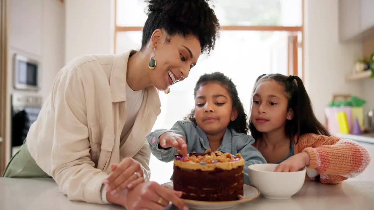 Happy family kid and decorating of cake