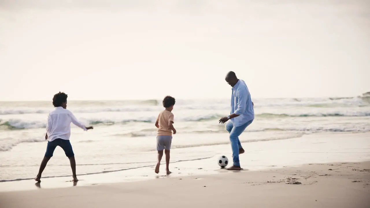 Soccer happy family on beach together for holiday