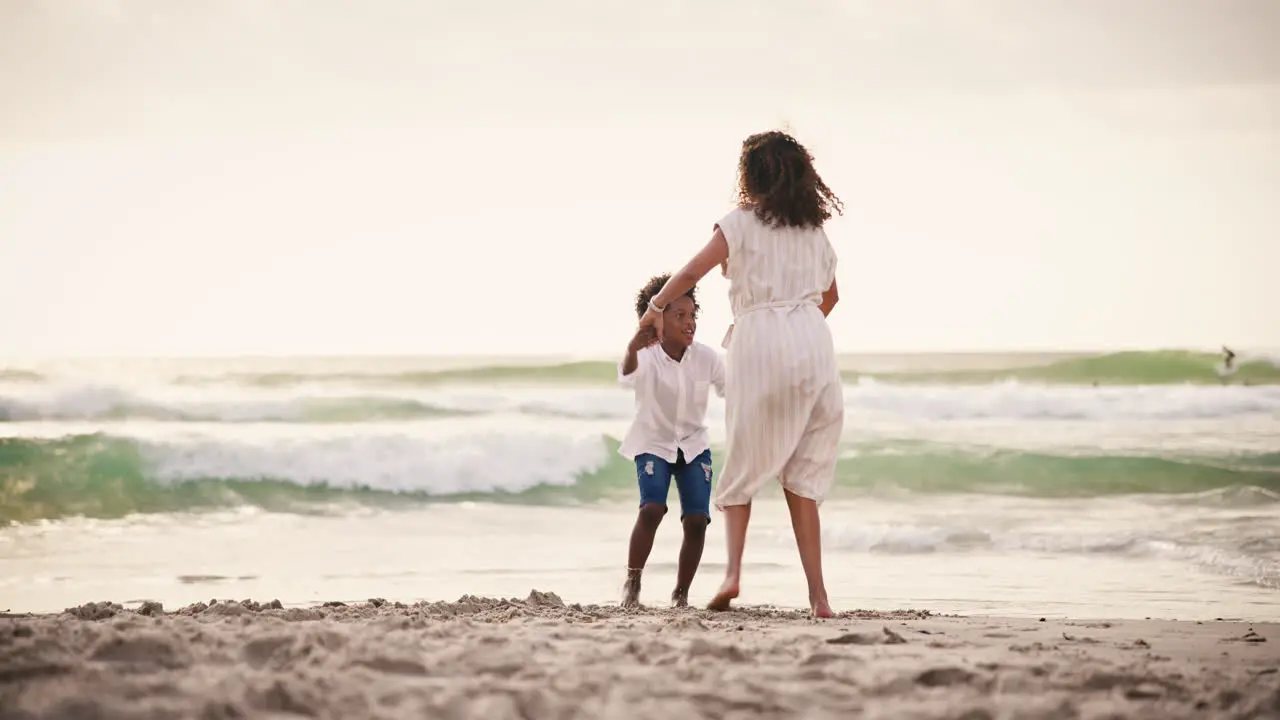 Beach love and mother hug boy child at the ocean