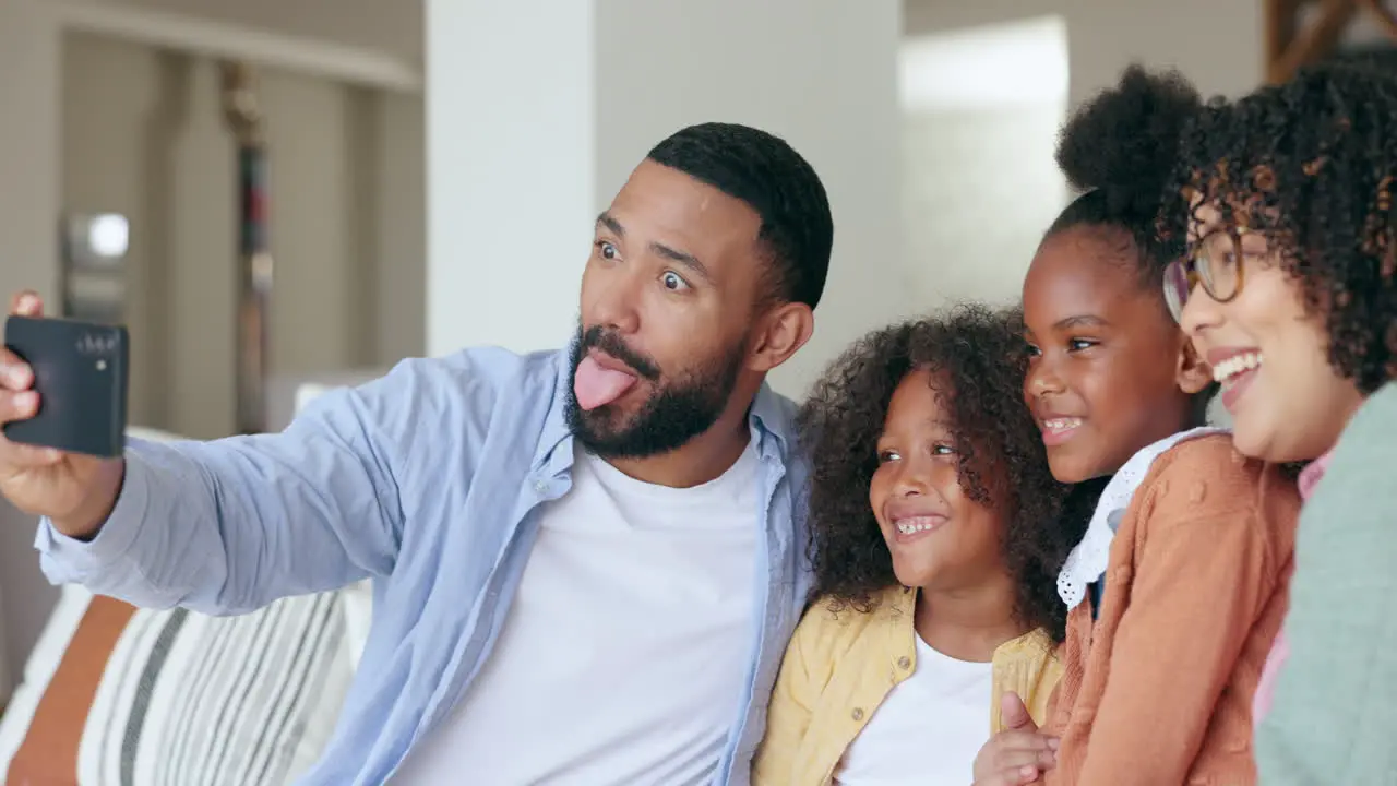 Happy family mother or dad in a selfie with kids