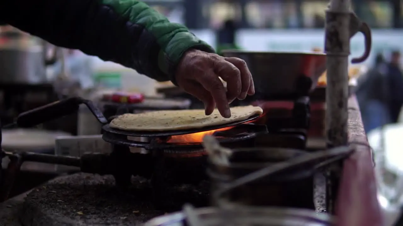 Aloo paratha a popular dish in north India being prepared by a street vendor near Shimla India