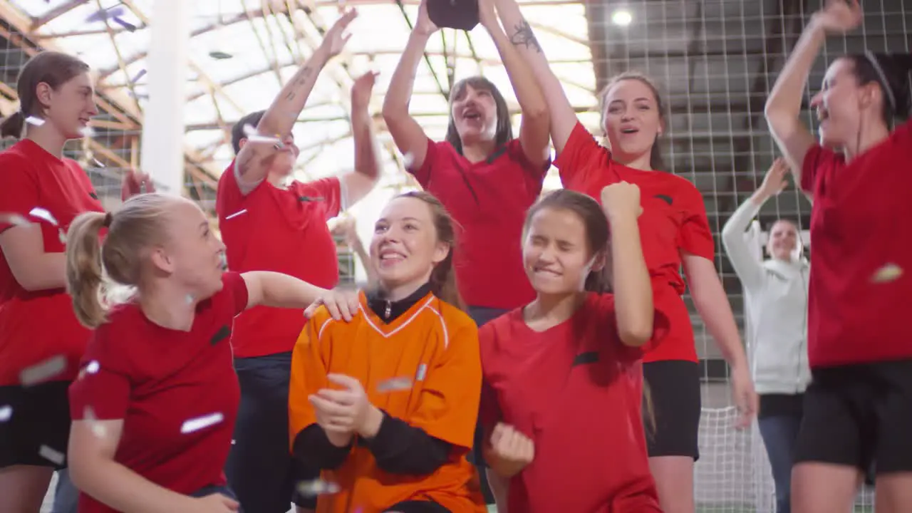 Women Football Players Celebrating After Winning The Championship