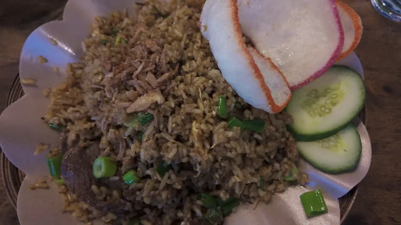 Nasi goreng sapi or beef fried rice on a plate Indonesian traditional food cuisine close up