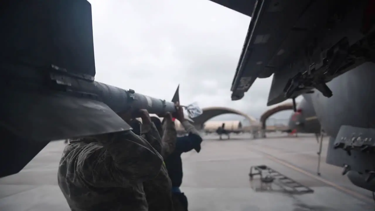 Air Force 334th Amu Weapons Load Weapons Onto Fighter Planes At Seymour Johnson Air Force Base Nc