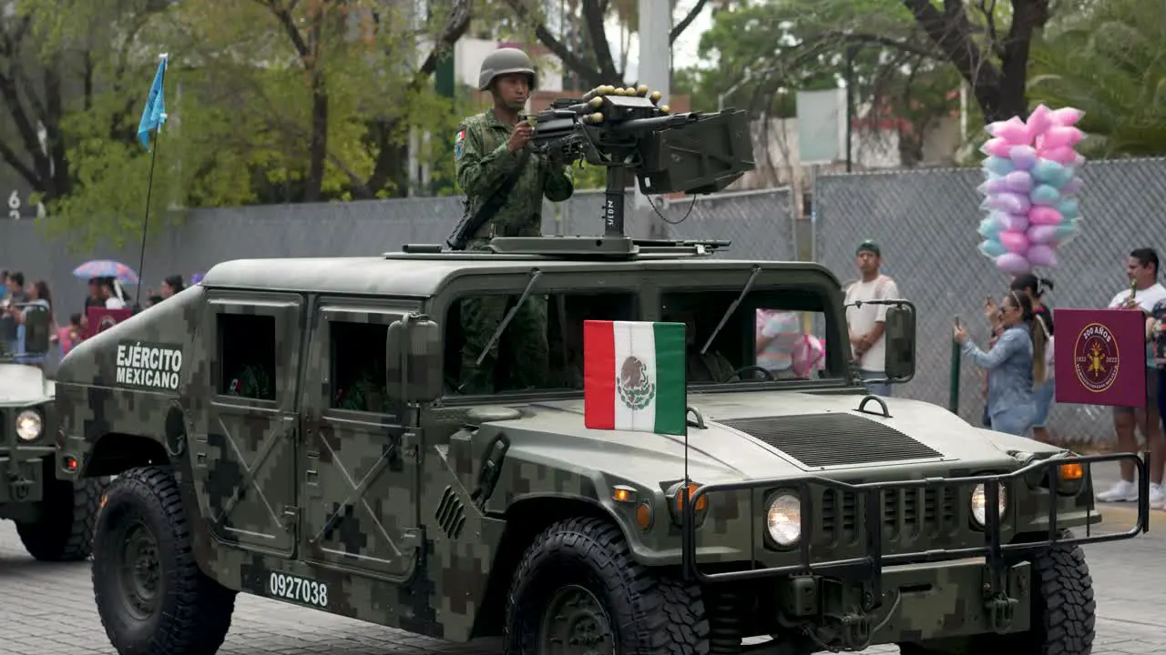 Mexican military driving humwee equiped with granade launcher