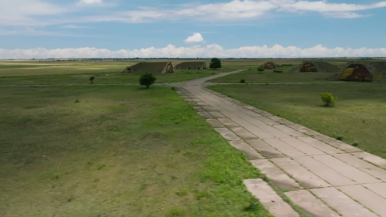 Abandoned Shiraki soviet military airbase with hangars and runway