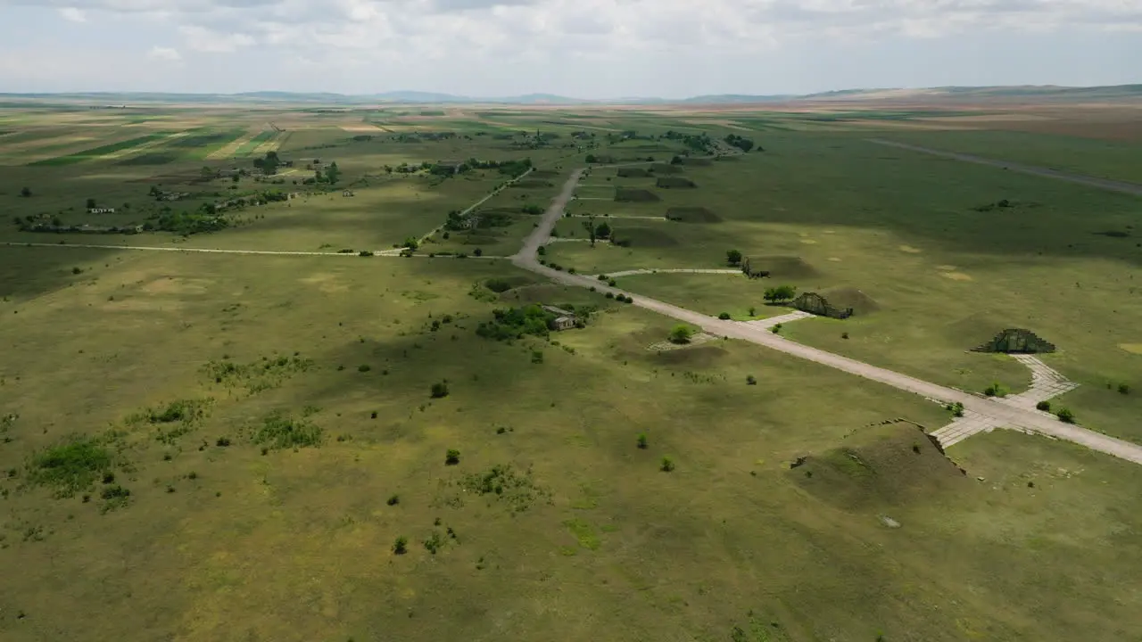 Runway and hangars of Big Shiraki military airfield in plains Georgia