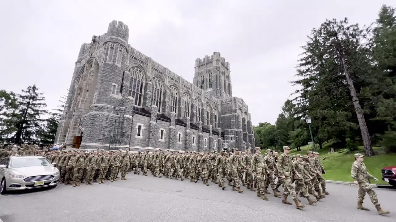 cadets march in front of the cadet chapel at west point new york at the united states military academy