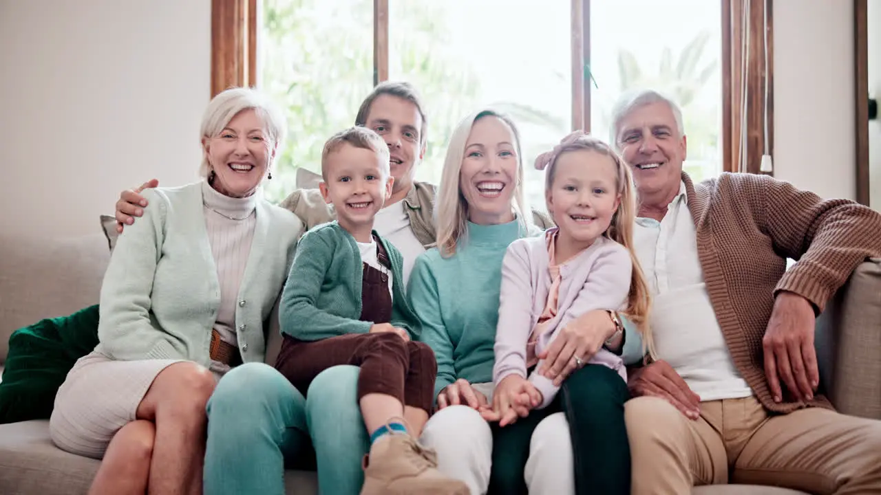 Big family face and smile on sofa in home