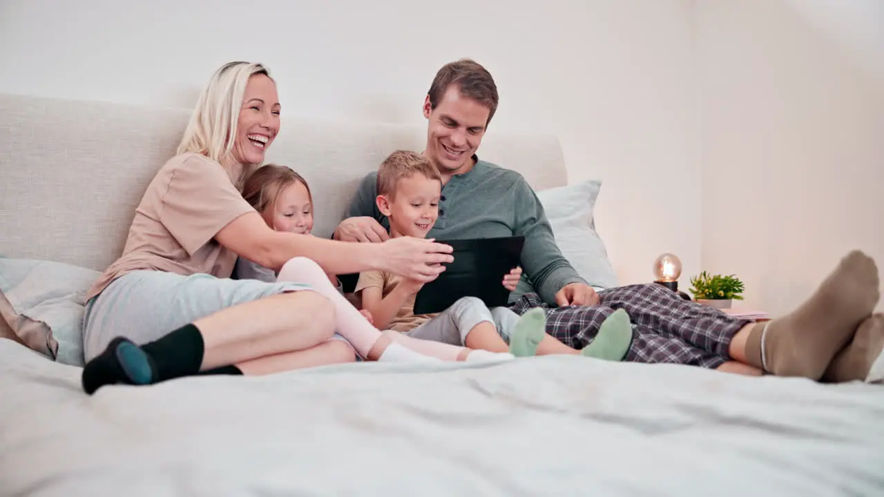 Parents kids and tablet on bed for selfie