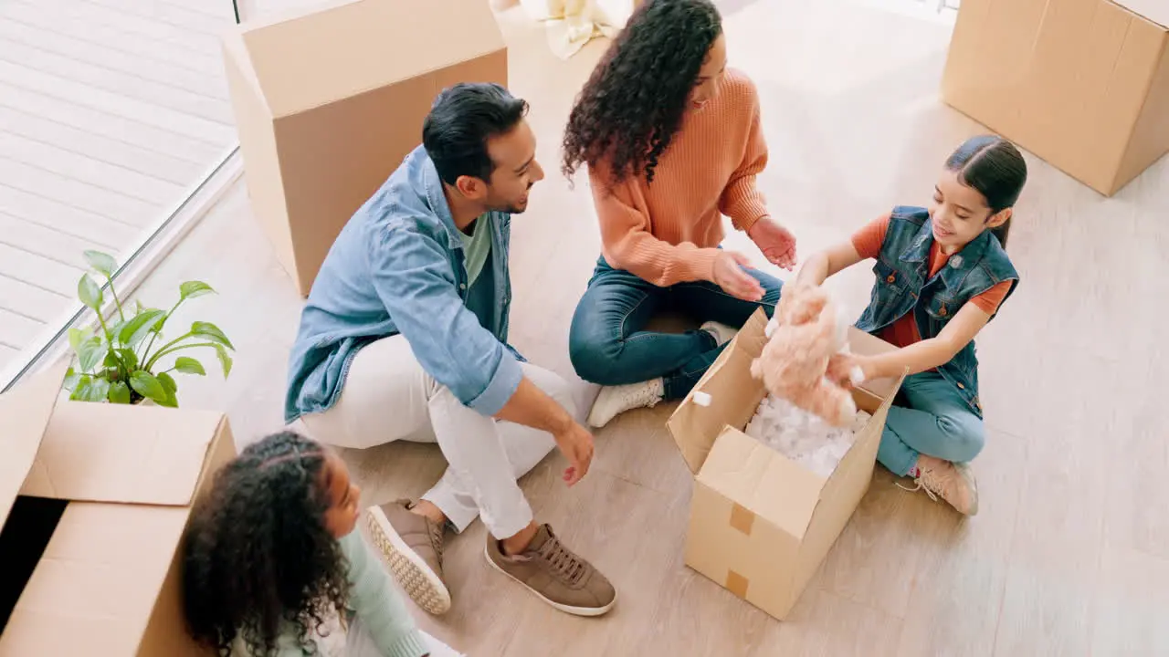 Happy family box and real estate in new home