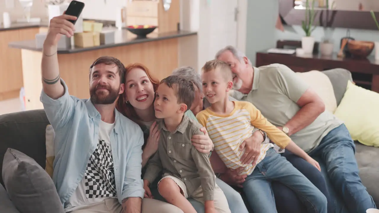 Selfie love and happy big family on a sofa