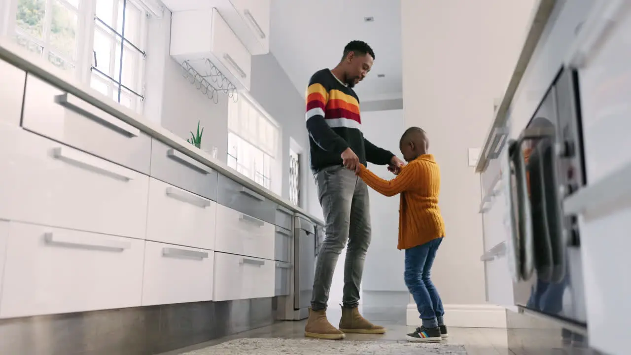 Father kitchen and black family kid dance