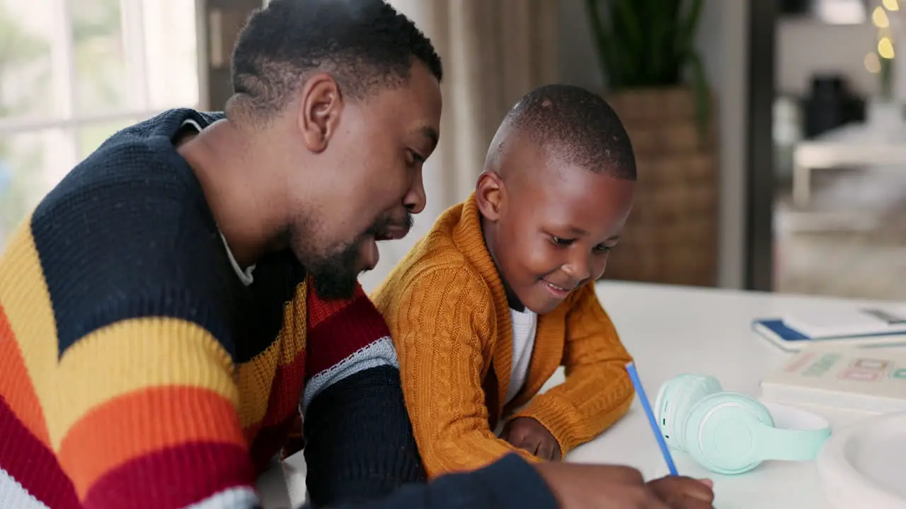 Black family writing and father with child