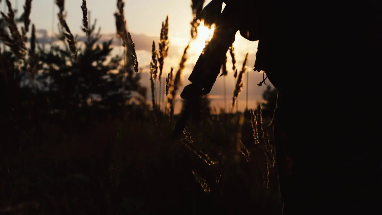 A solider aims his rifle 5