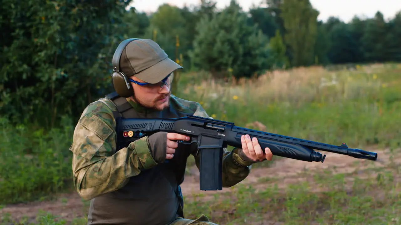 Soldier fires a rifle