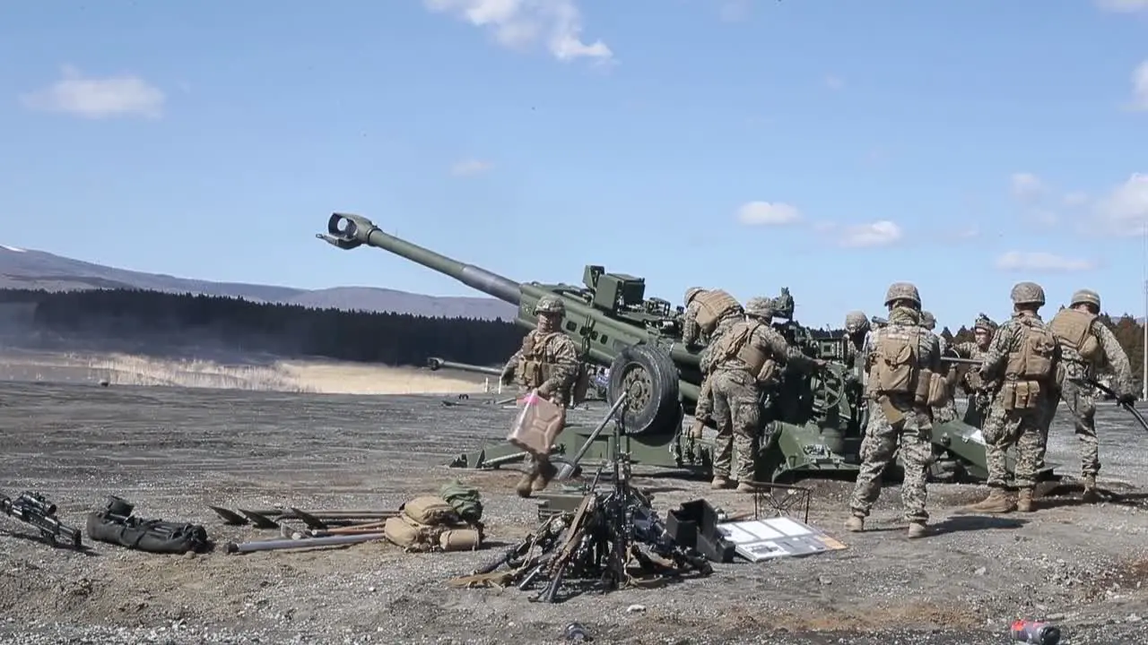 Teams Of Us Marines Conduct Live Fire Artillery Gunnery Practice Beneath Snow Capped Volcano At Camp Fuji Japan