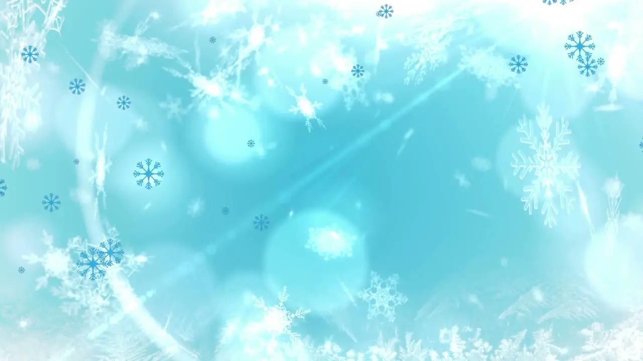 Animation of snowflakes and lens flares over blue background