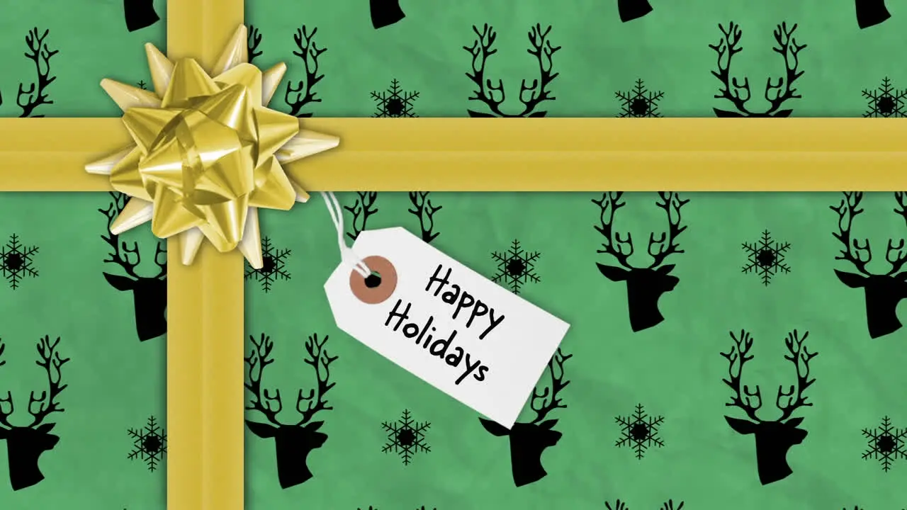 Animation of ribbons and abstract changing shapes and happy holidays text on gift box