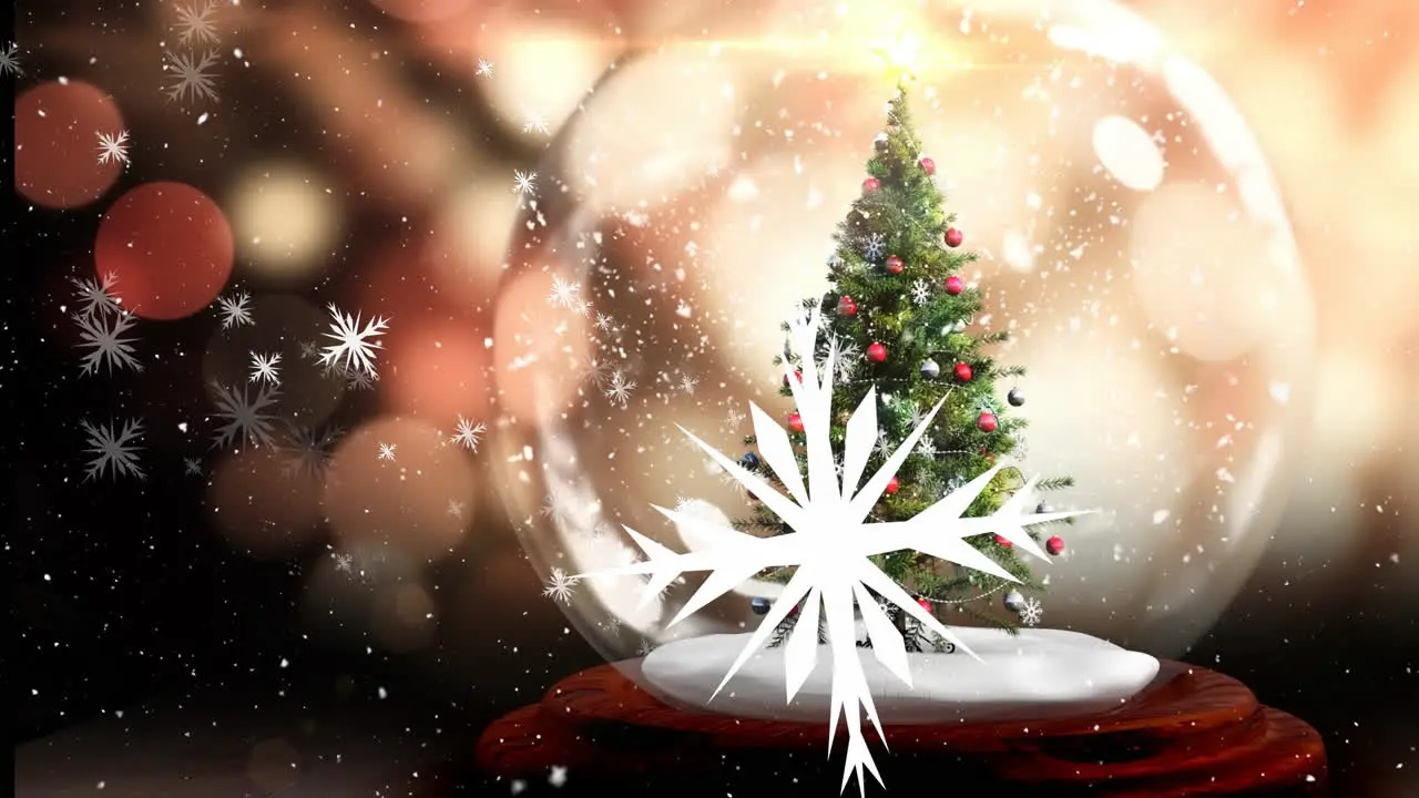 Animation of snowflakes and snowfall over decorated tree in glass sphere against lens flares