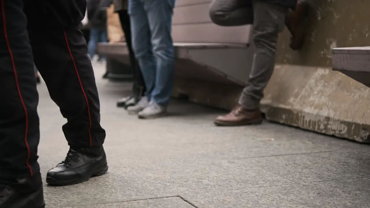 Legs Of Carabinieri In Milan Italy Military Police Force Wearing Boots Walking Outside On A Concrete Floor