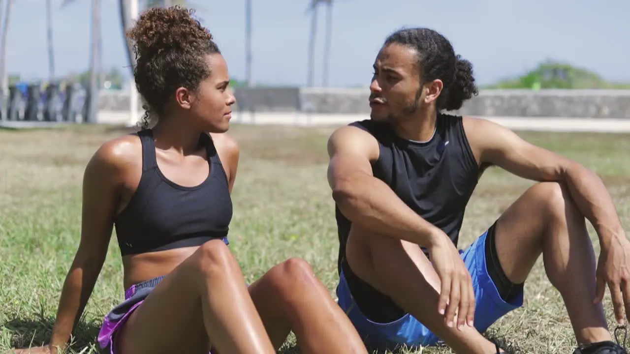 Couple interacting and resting after sports