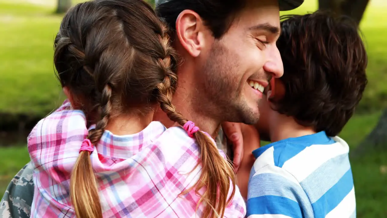 Happy soldier reunited with his son and daughter